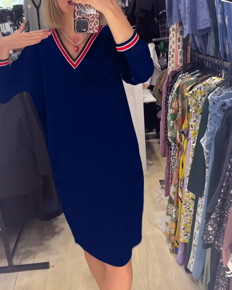 Elisa | Elegant V-neck dress with pockets