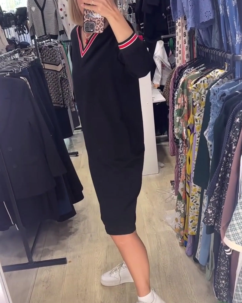Elisa | Elegant V-neck dress with pockets