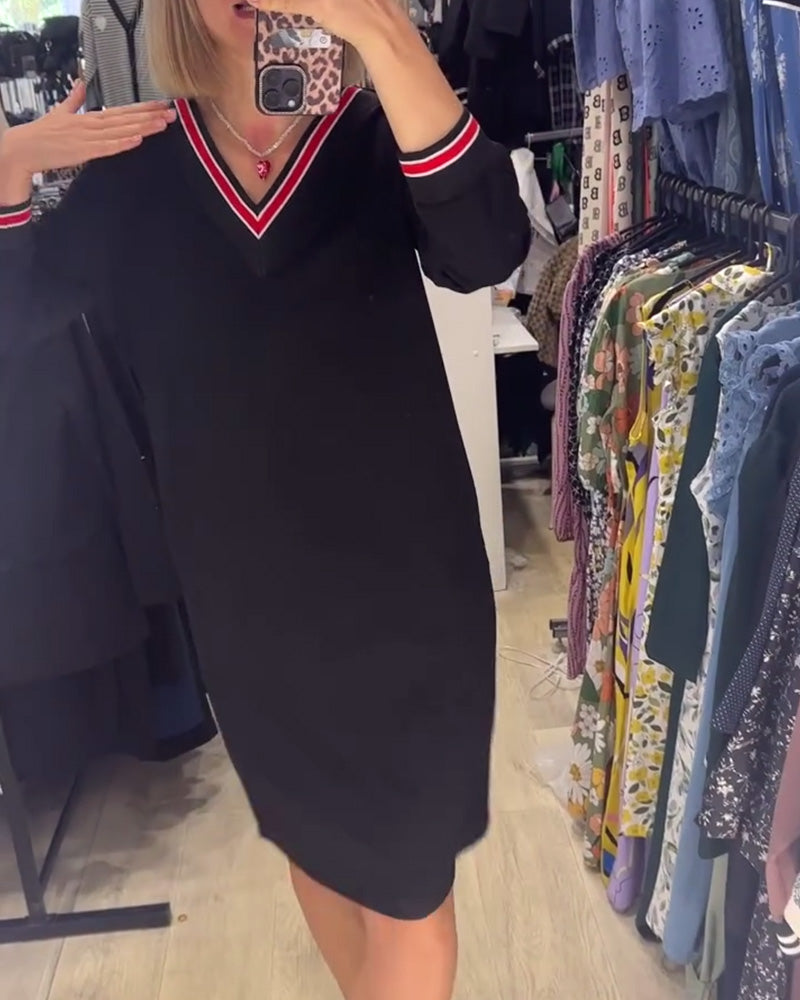 Elisa | Elegant V-neck dress with pockets