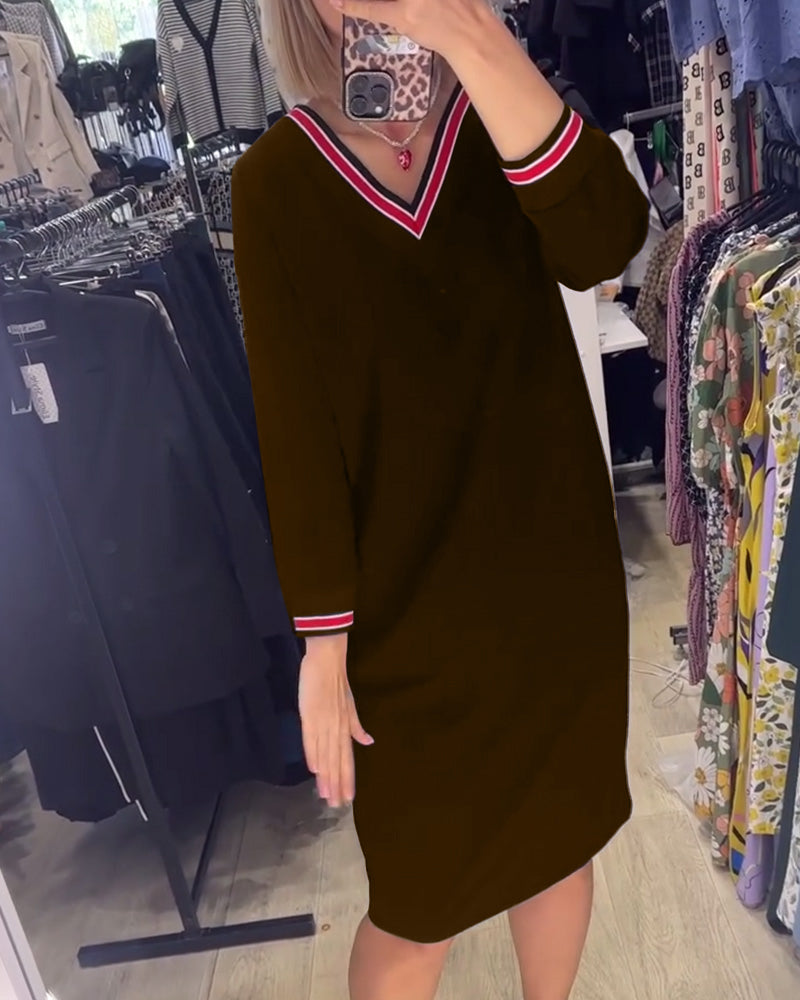 Elisa | Elegant V-neck dress with pockets